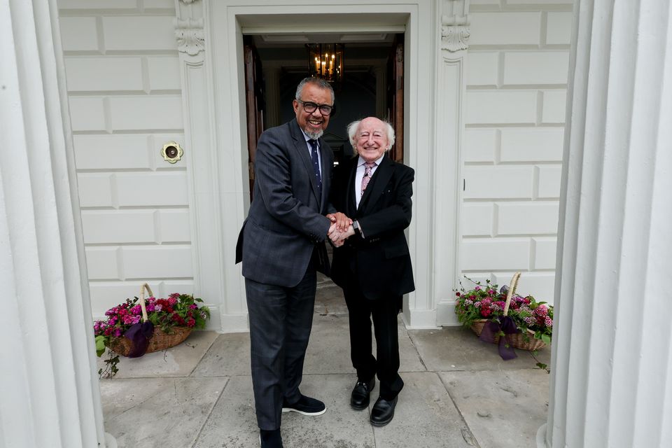 President Michael D Higgins greets WHO director general Dr Tedros Adhanom Ghebreyesus at Áras an Uachtaráin. Photo: Maxwells
